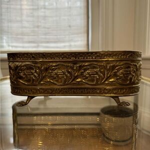 Brass footed planter with Coronet market's mark.